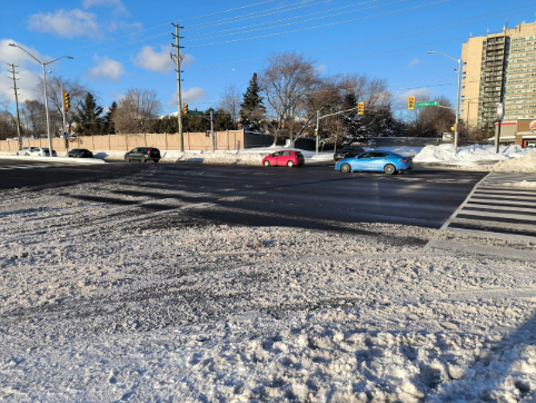 The hum of passing cars